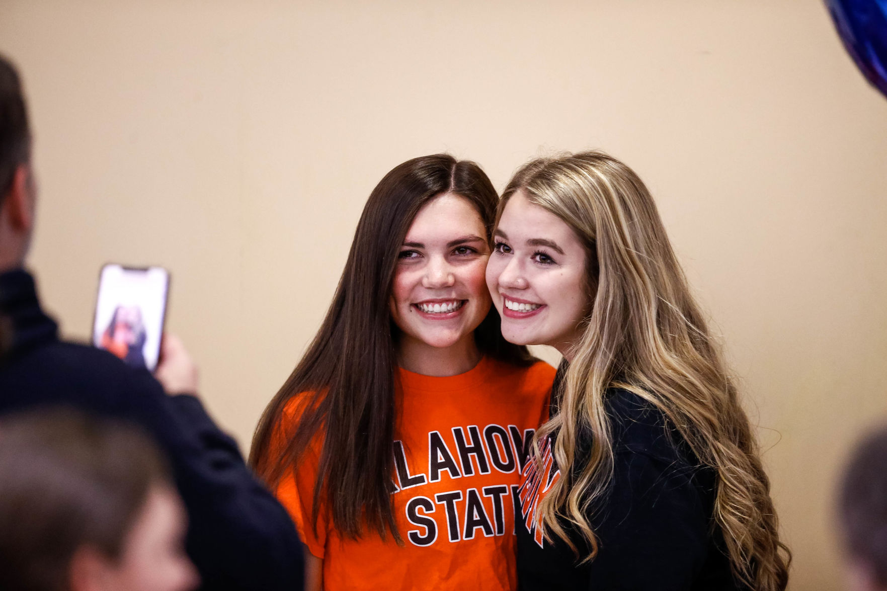 SIGNING DAY: Rampart athletes sign their National Letter of Intent